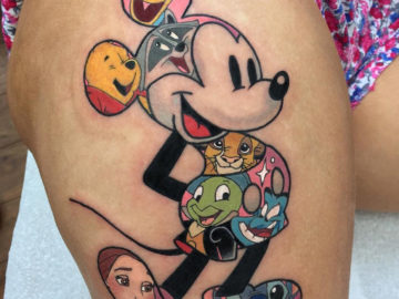 Disney characters thigh tattoo
