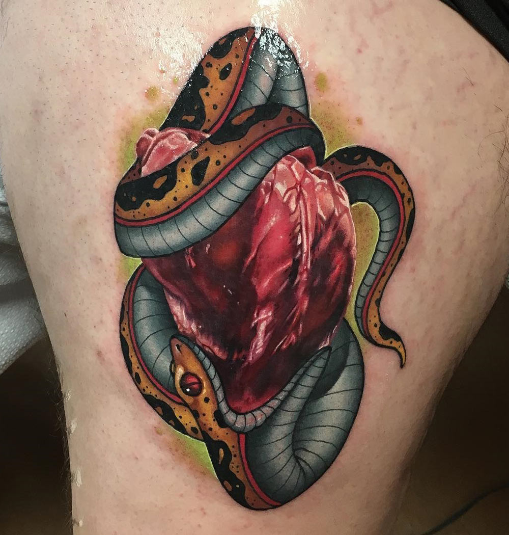 Snake & Heart thigh tattoo