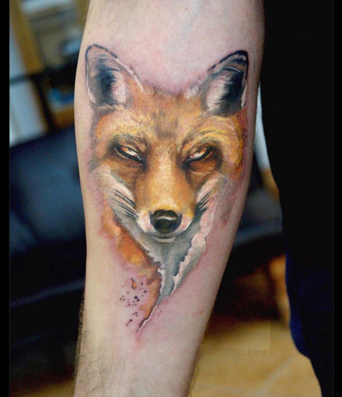 The Sly Fox, girls arm tattoo