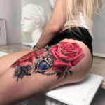 Pink roses & lace thigh tattoo