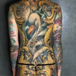 Swan & filigree back tattoo
