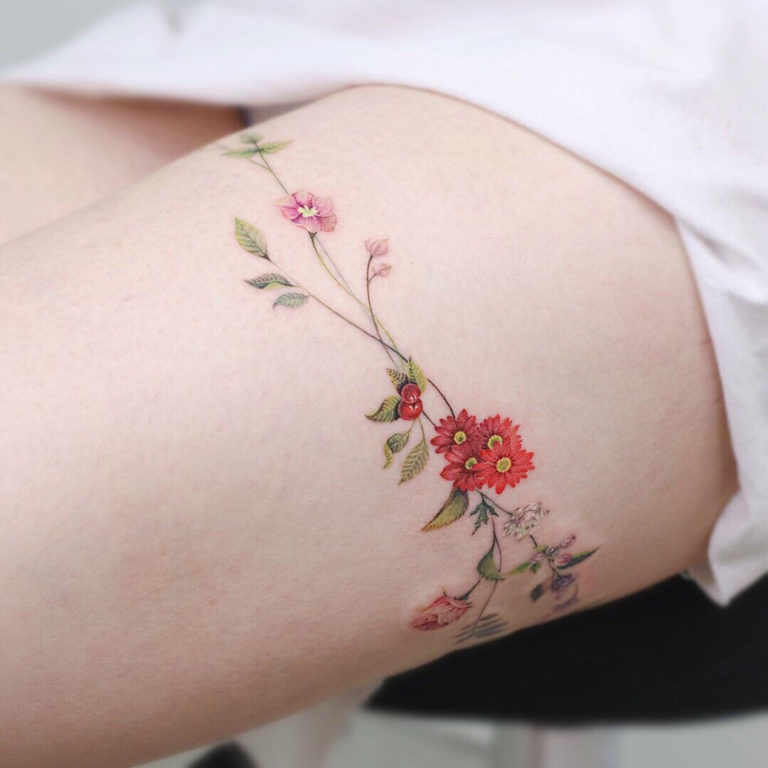 33 Stunning Flower Tattoos That Radiate Beauty and Softness