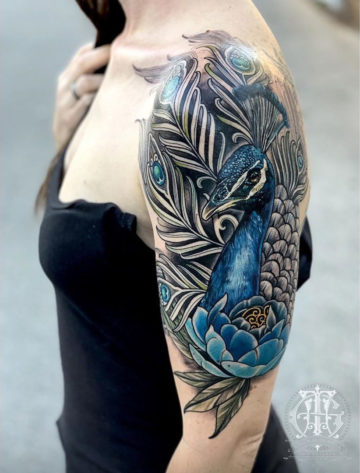 Peacock realism, girl's upper arm