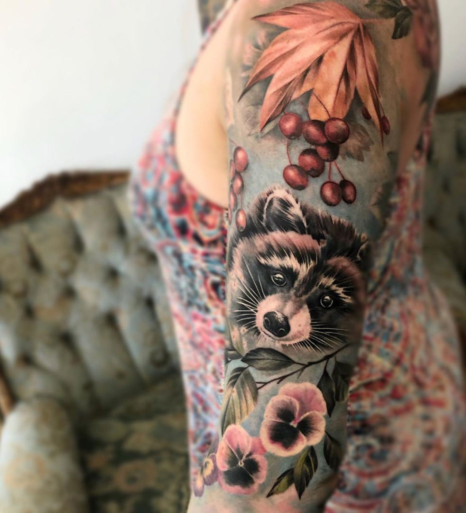 Tips For Aftercare Of Raccoon Holding Flower Tattoo