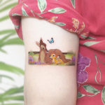 Bambi, small arm tattoo