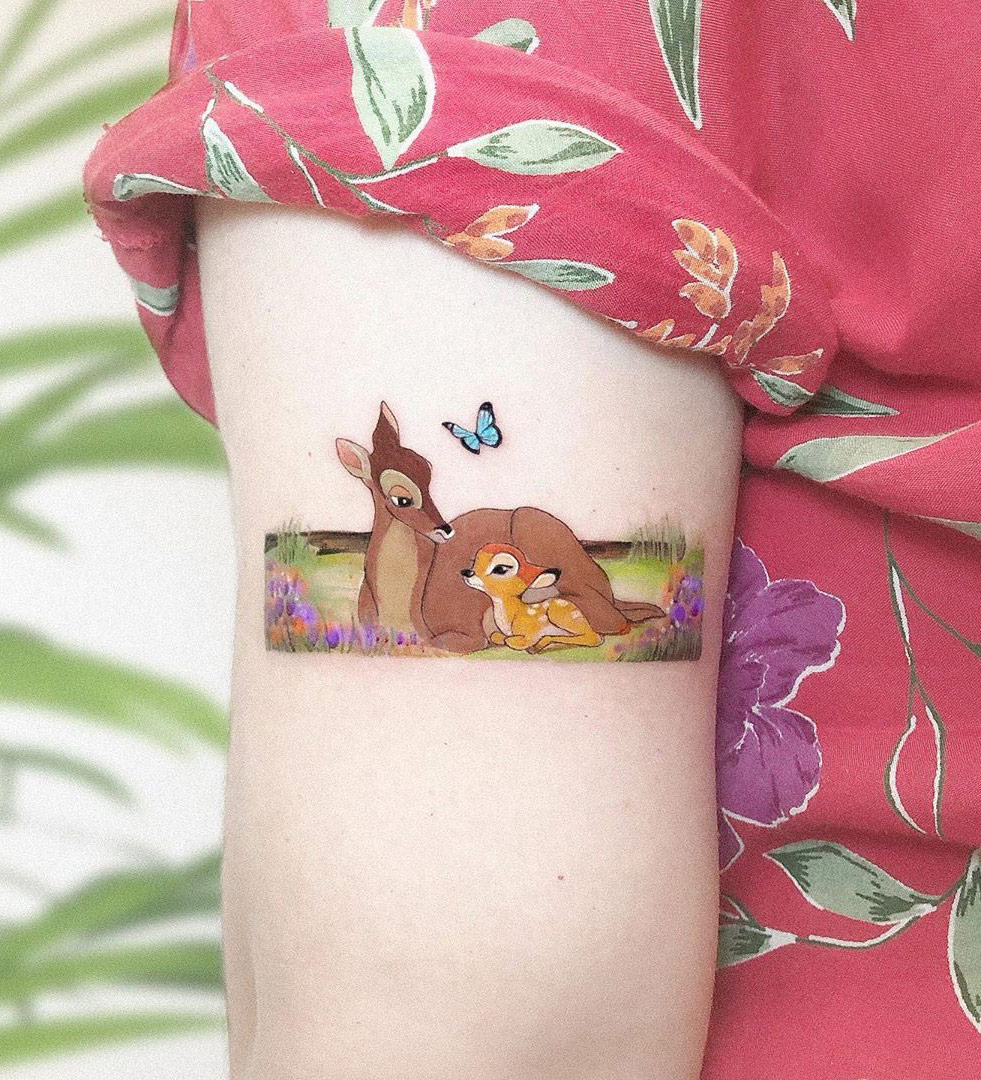 Bambi, small arm tattoo