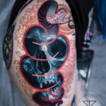 Skull & Snake Hip Tattoo