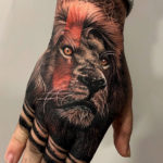 Lion Hand Tattoo