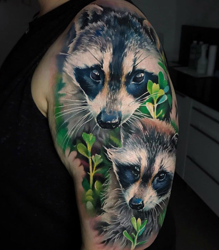 Raccoons arm tattoo