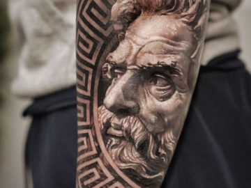 Poseidon men's forearm tattoo idea