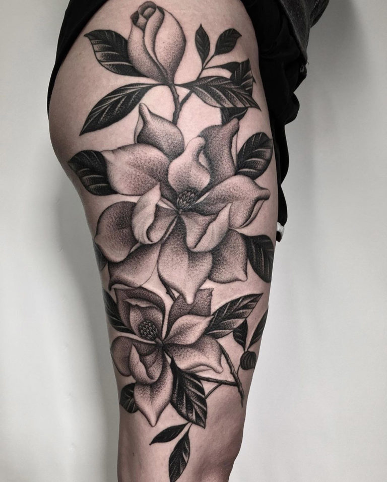 Magnolias b&g thigh tattoo