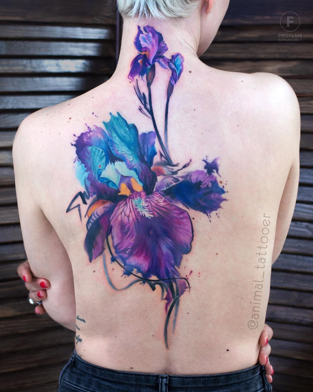 iris flower watercolor back tattoo