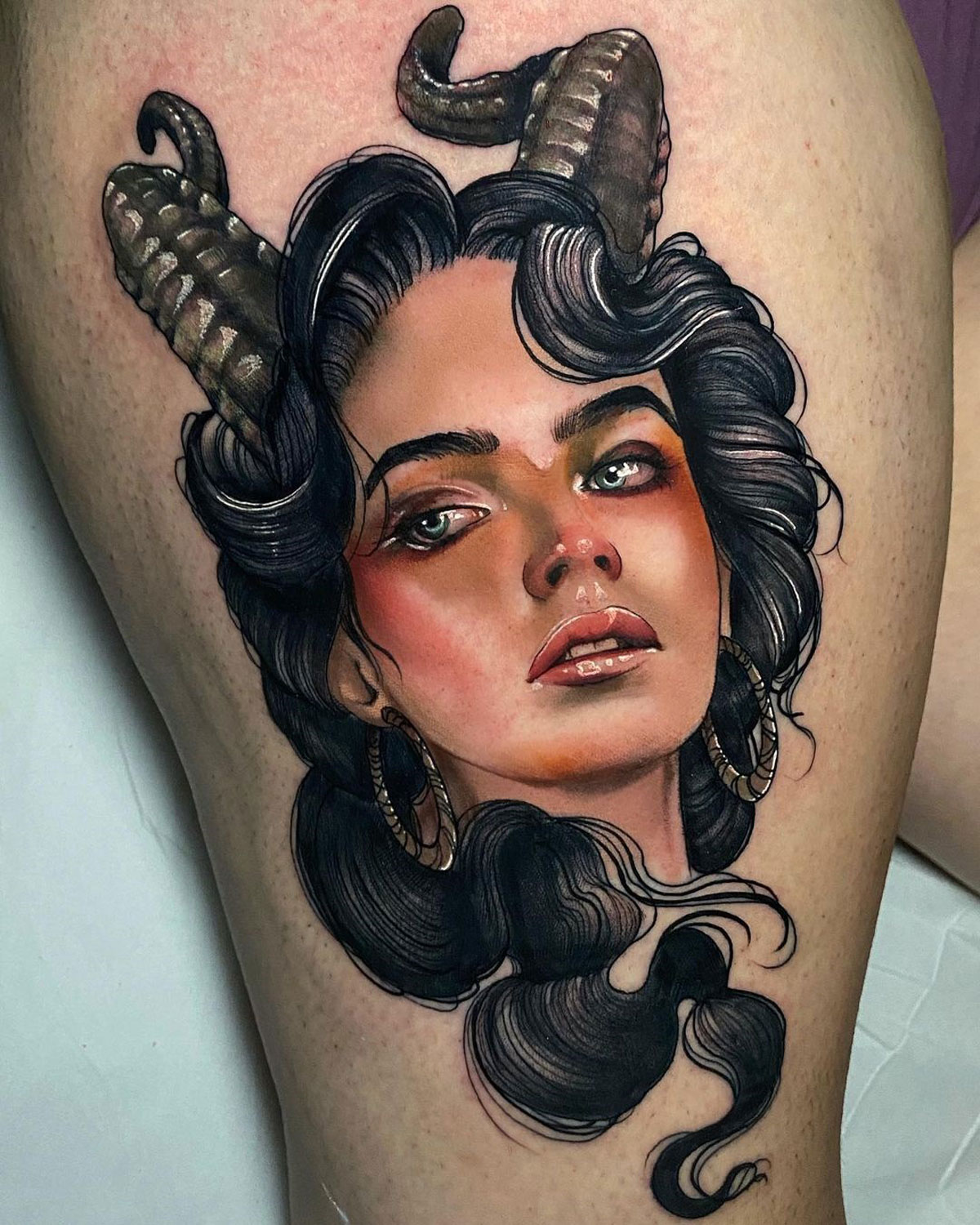 Demon Woman by Raquel, a traveling artist working at Tattoo Freaks Castelld...