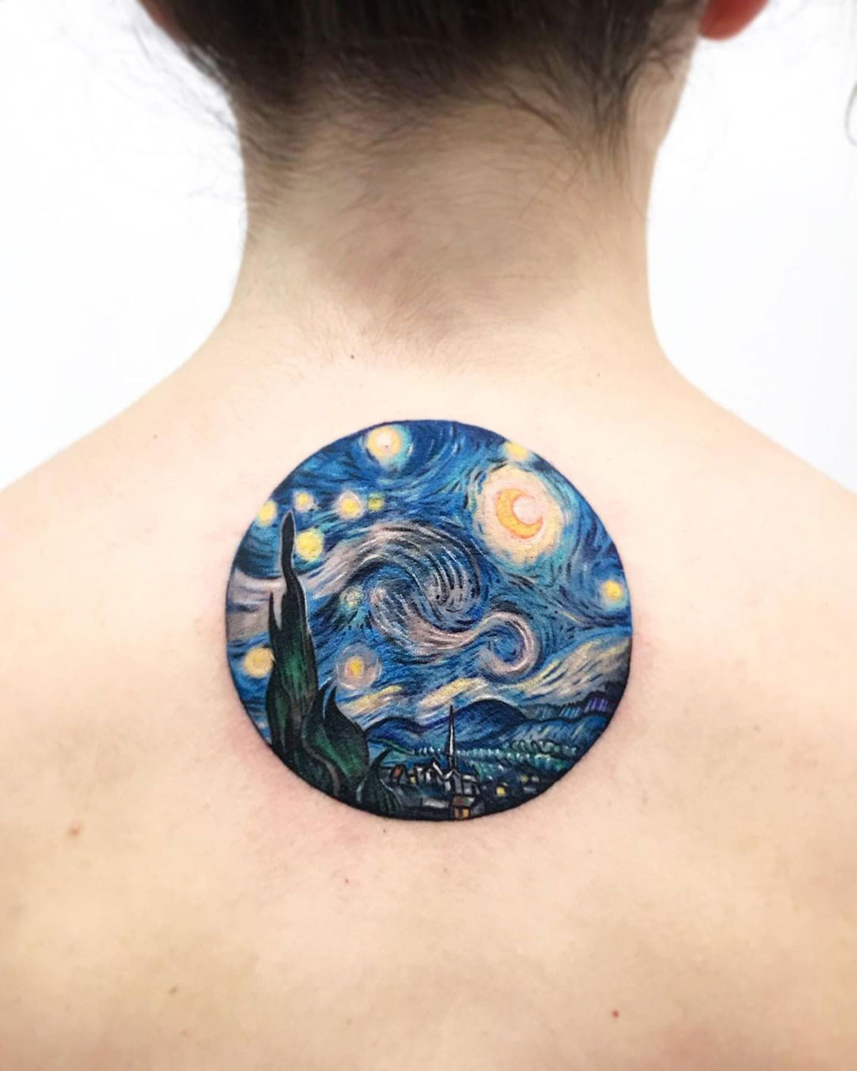 A tattoo inspired by Van Gogh's The Starry Night painting.