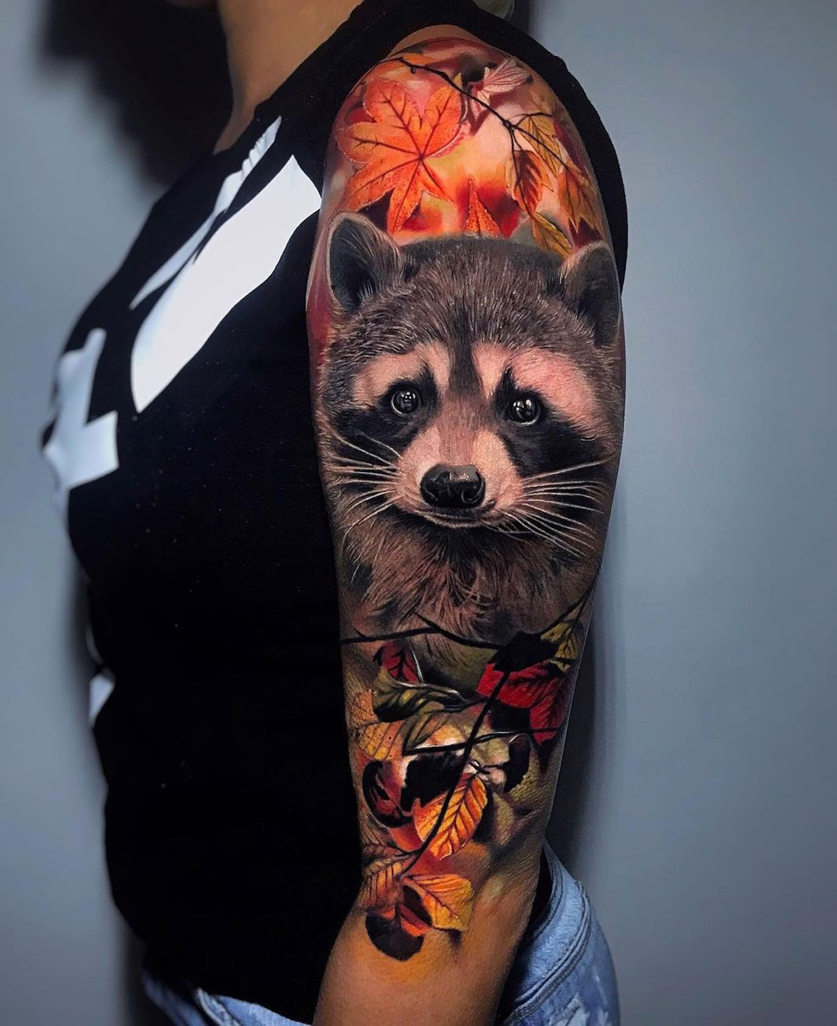Cute Raccoon with autumn leaves