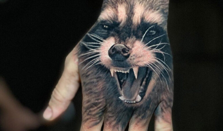 Raccoon Hand Tattoo