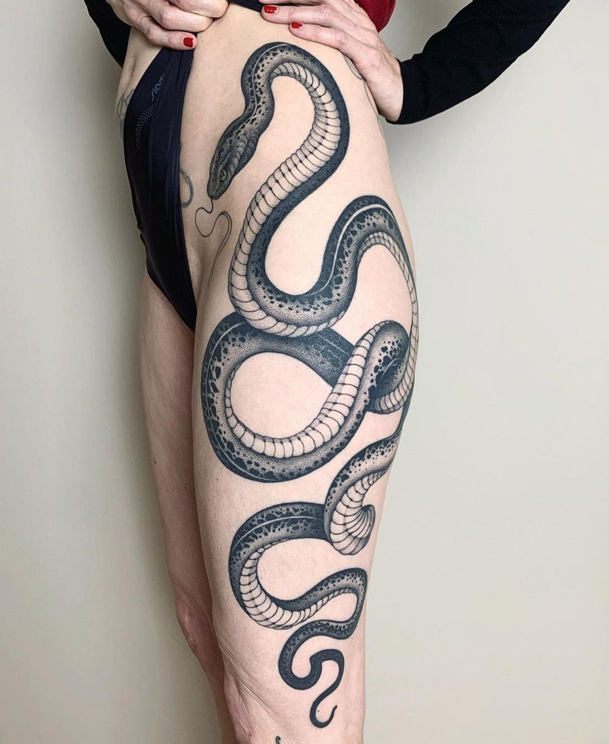 Snake on the leg by Monkey Bob - Tattoogrid.net